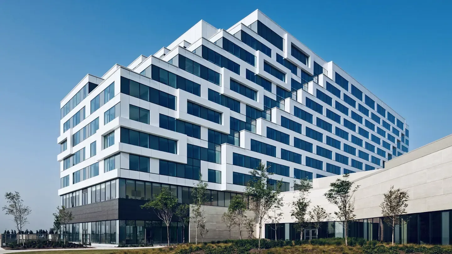 Contemporary hotel exterior beside a casino resort complex